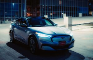 Ford Mustang Mach E in the parking lot at night